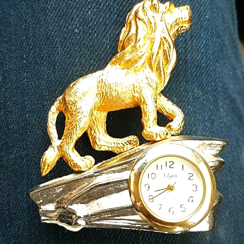 vtg miniature lion king clock